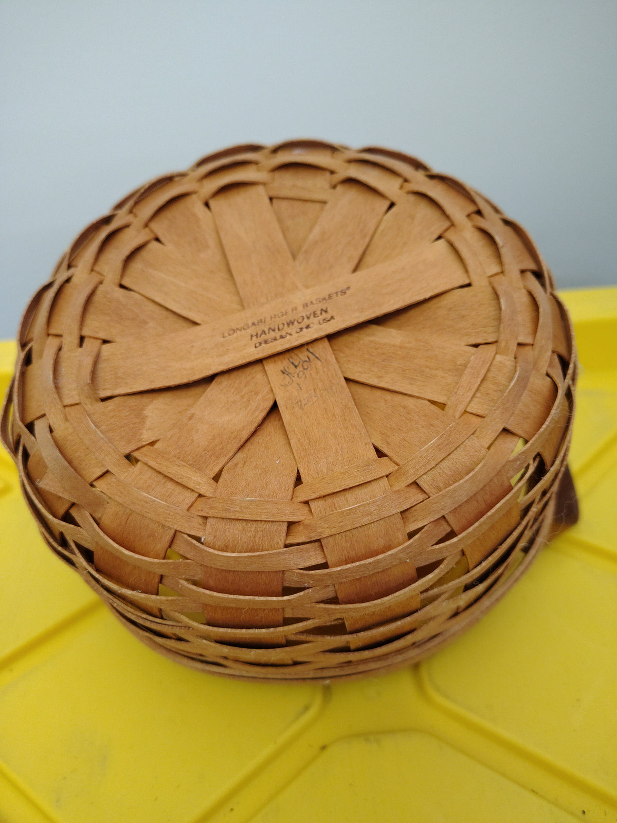 Longaberger button basket with stained protector