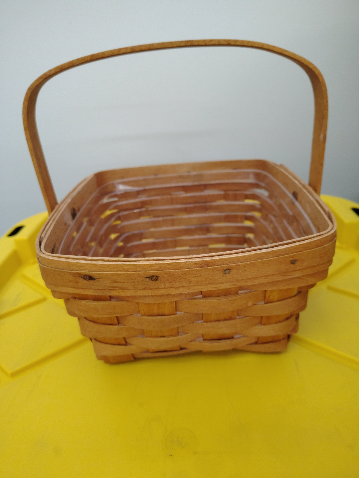 Longaberger large berry basket with protector.  Bottom is dirty