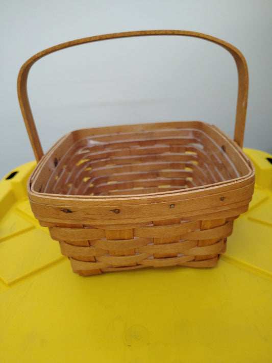 Longaberger large berry basket with protector.  Bottom is dirty