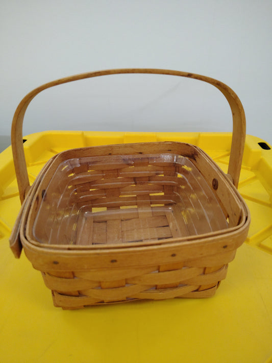 Longaberger medium berry basket with protector, has some discoloration